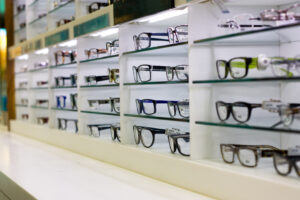 Picking eyeglasses from a framewall